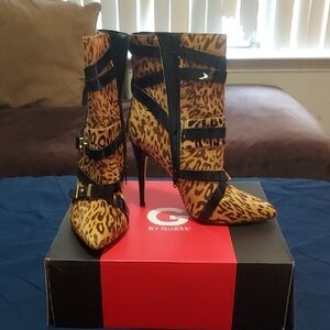 Guess Brown and Black Heeled Boots with Sleek Silhouette